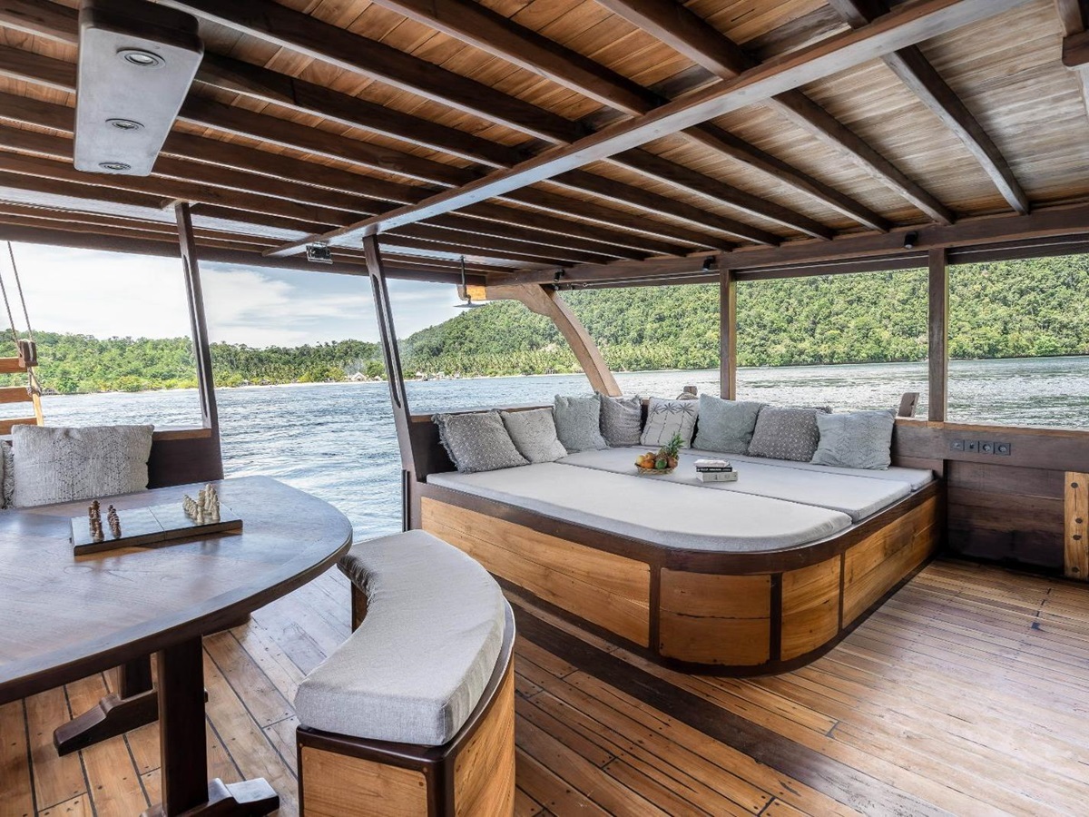Lower outside lounge onboard the Dewata phinisi in Indonesia