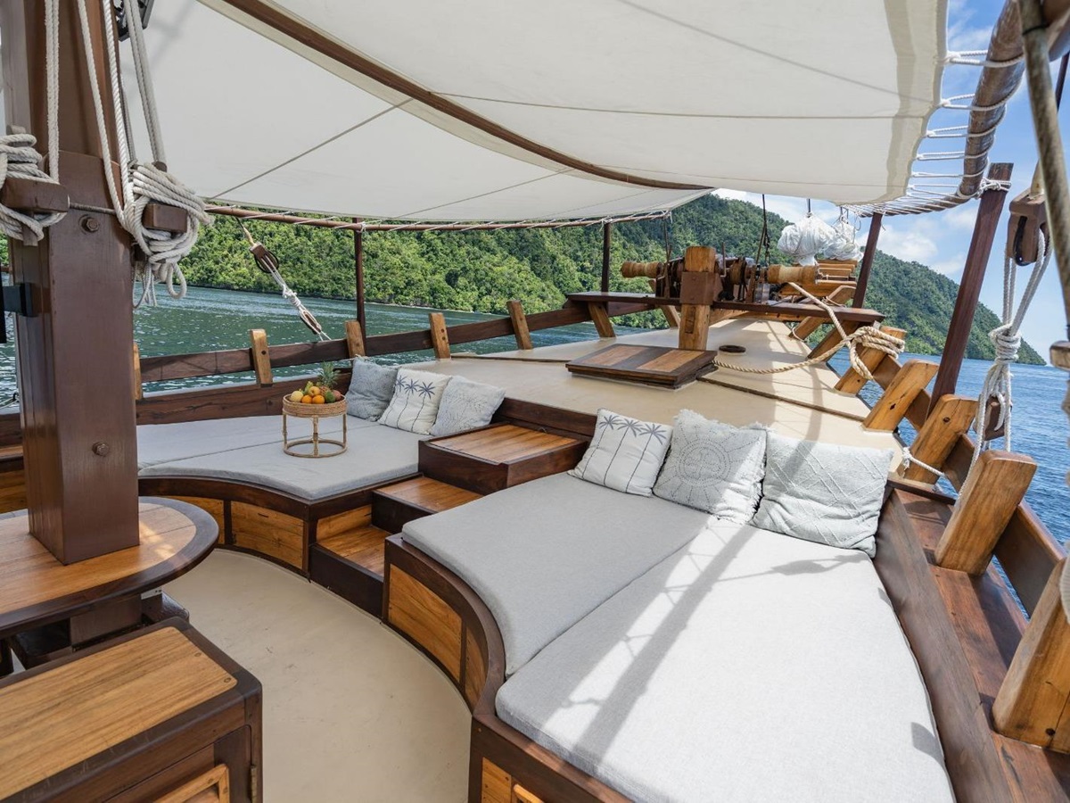 Upper outside lounge area onboard the Dewata phinisi in Indonesia