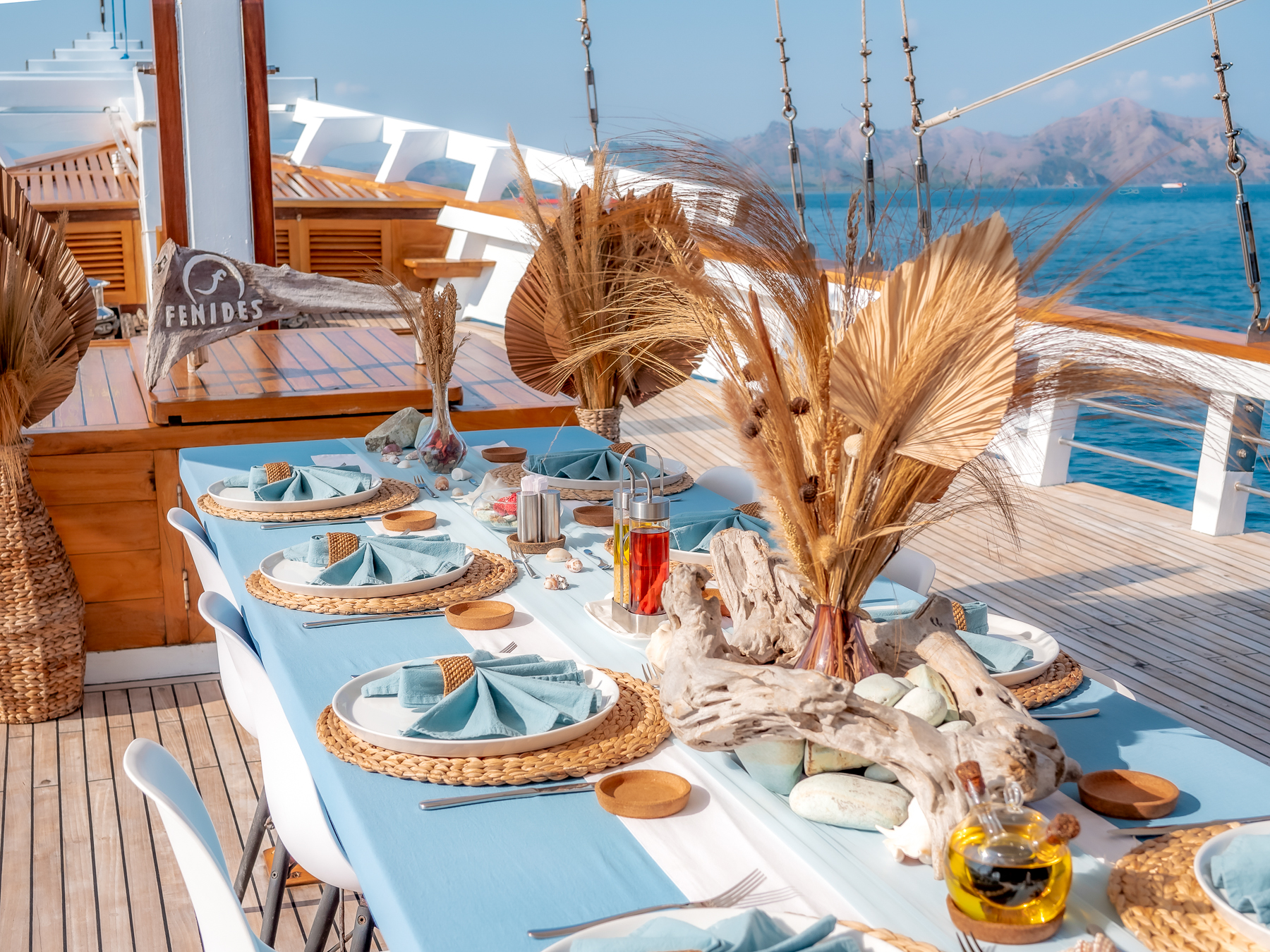 Dining table onboard the Fenides luxury phinisi in Indonesia