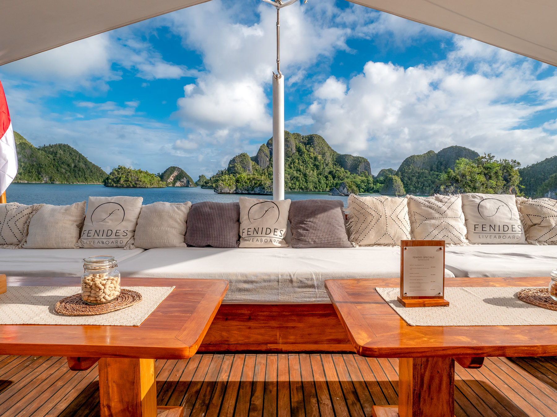 Outdoor lounge onboard the Fenides luxury phinisi in Indonesia