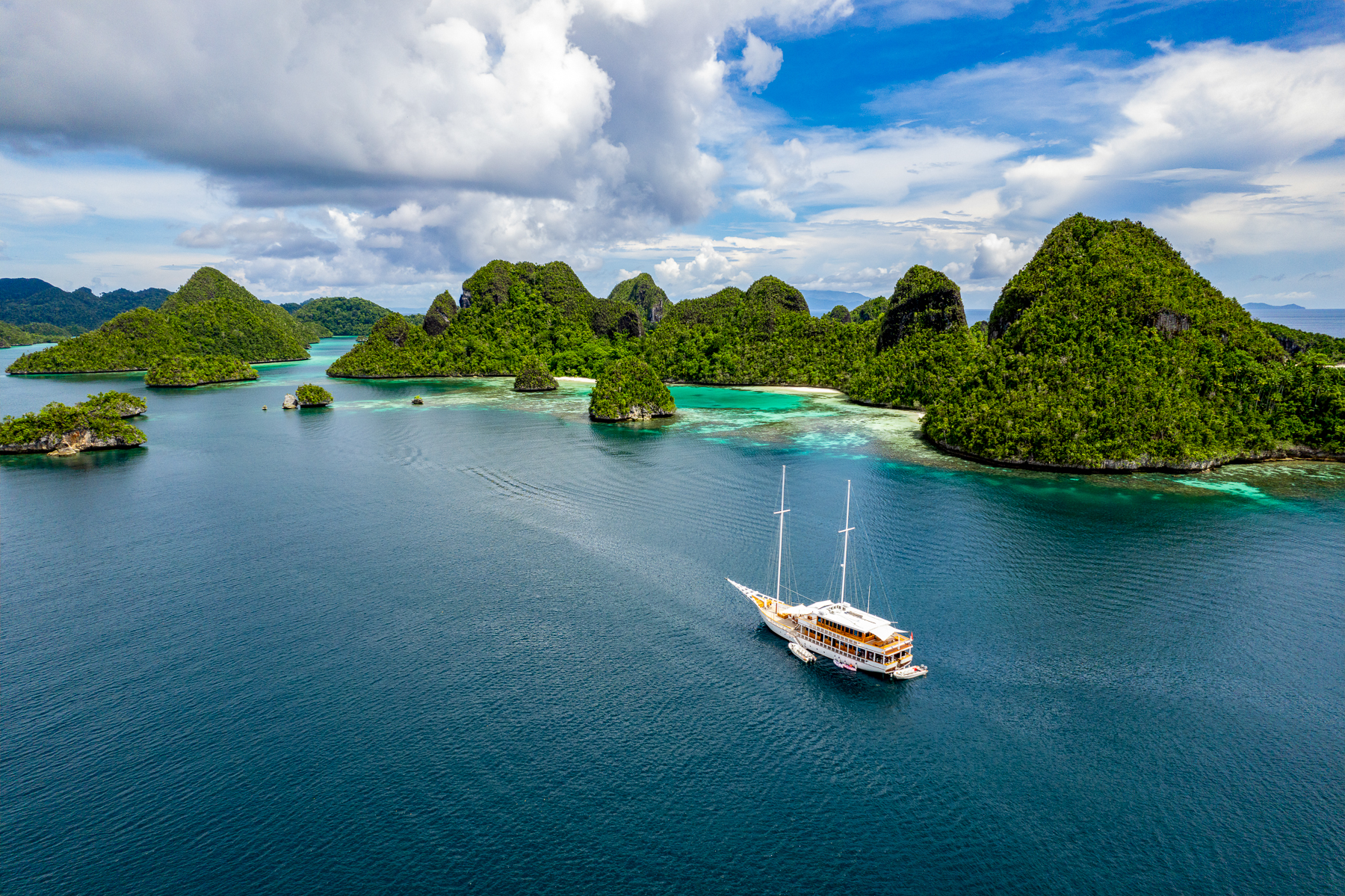 Aerial view of the Fenides luxury phinisi in Raja Ampat