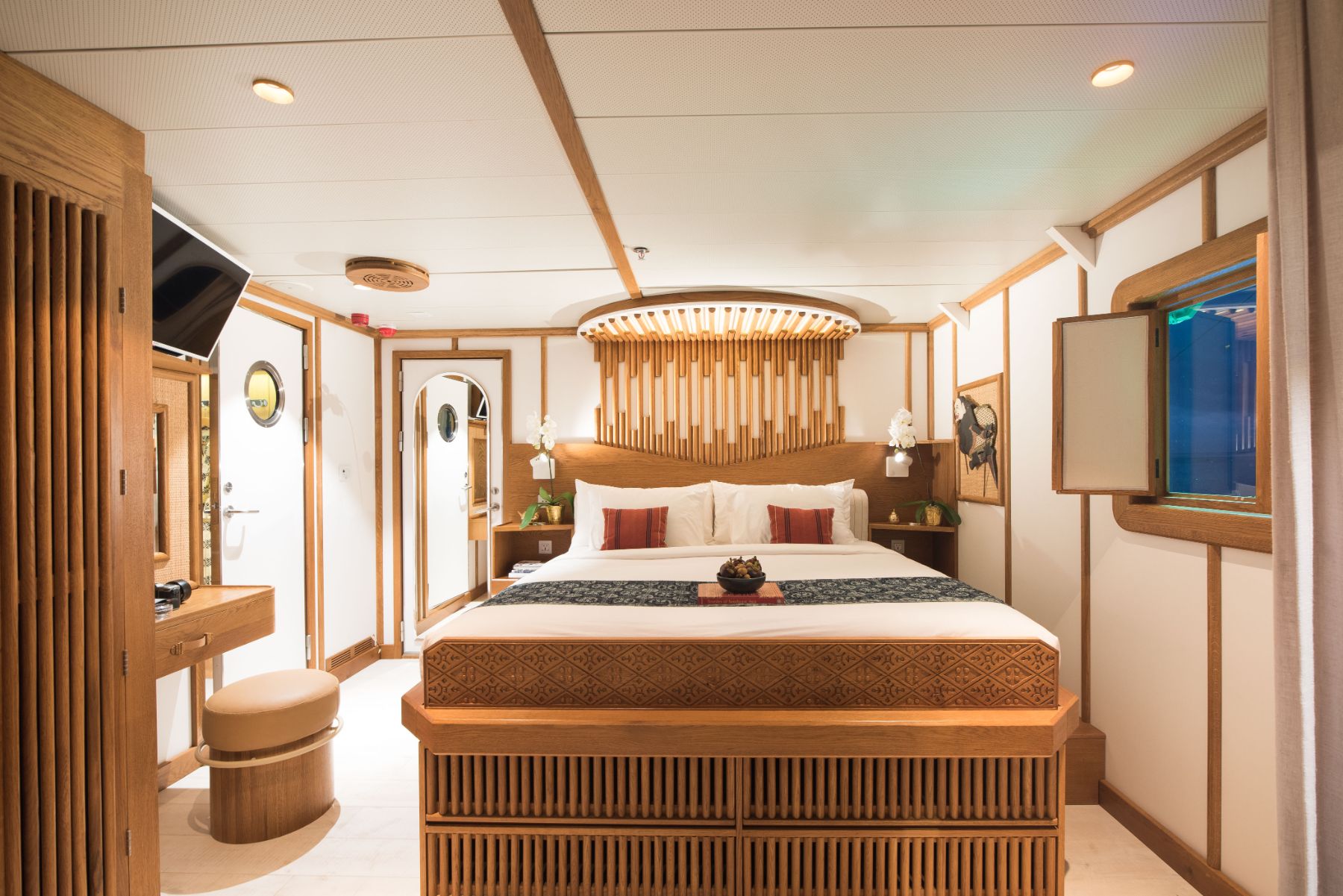 A cabin bedroom on the Kudanil Explorer in Indonesia