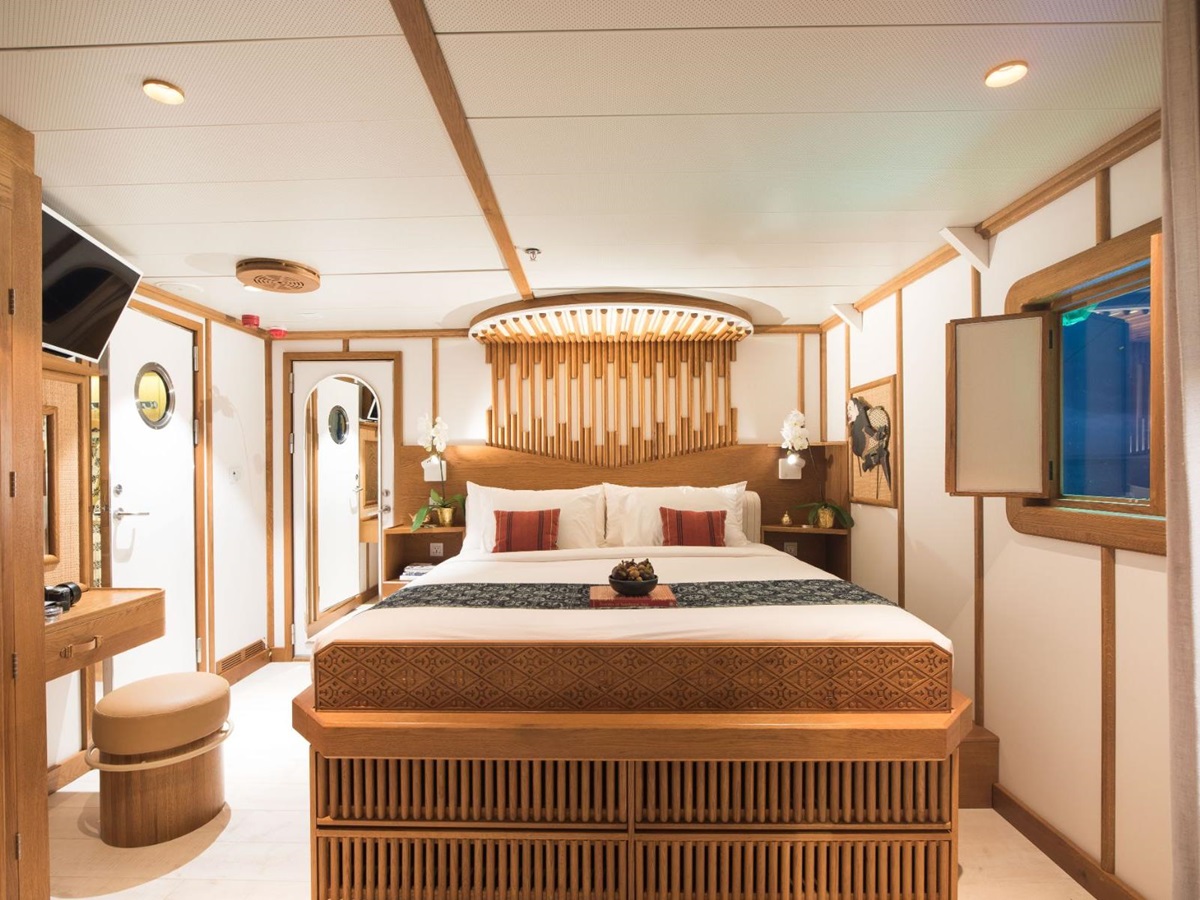 A cabin bedroom on the Kudanil Explorer in Indonesia