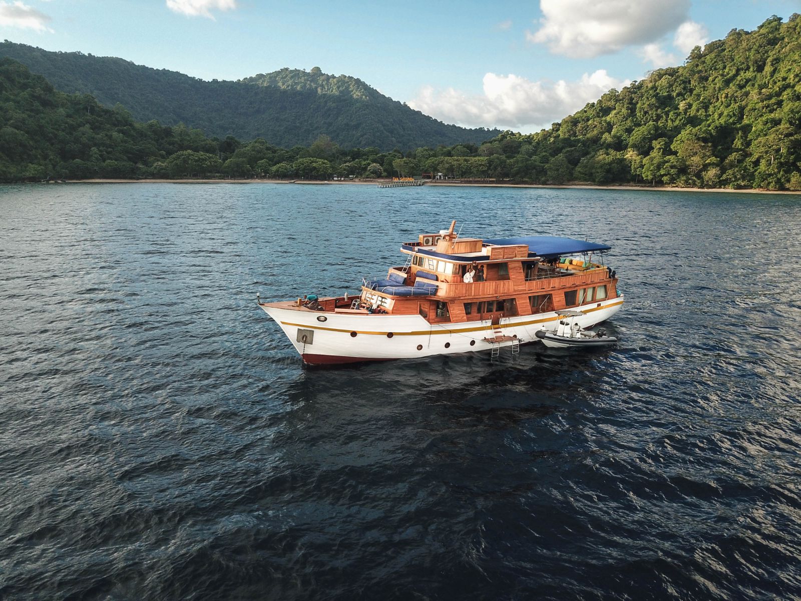 Exterior aerial view of the Magia II phinisi on Indonesian seas