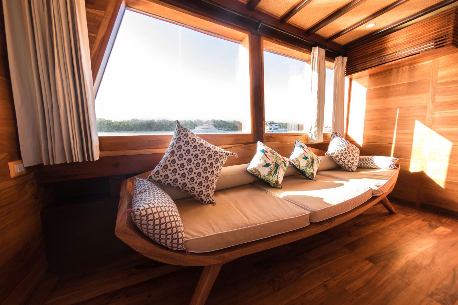 Indoor sofa onboard the Magia II phinisi on Indonesian waters