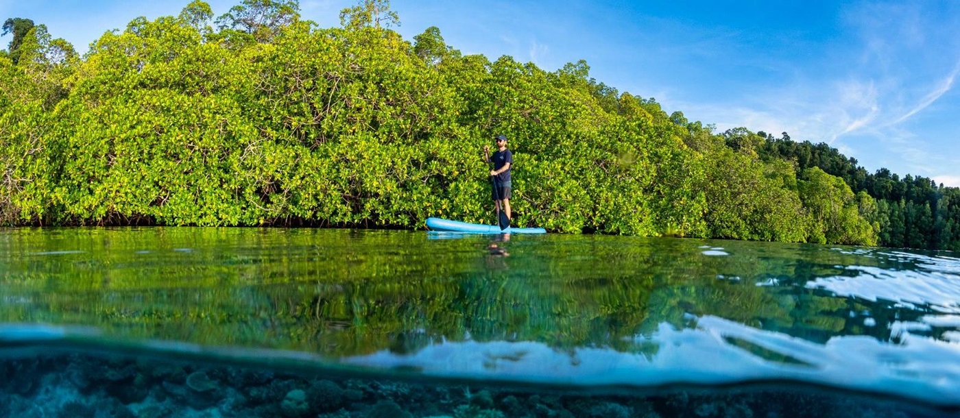 paddleboarding from the Majik phinisi in Indonesia