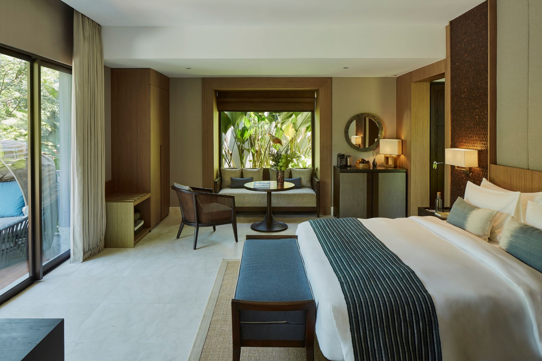 Bed in a Jungle Pool Pavilion at Nirjhara in Bali