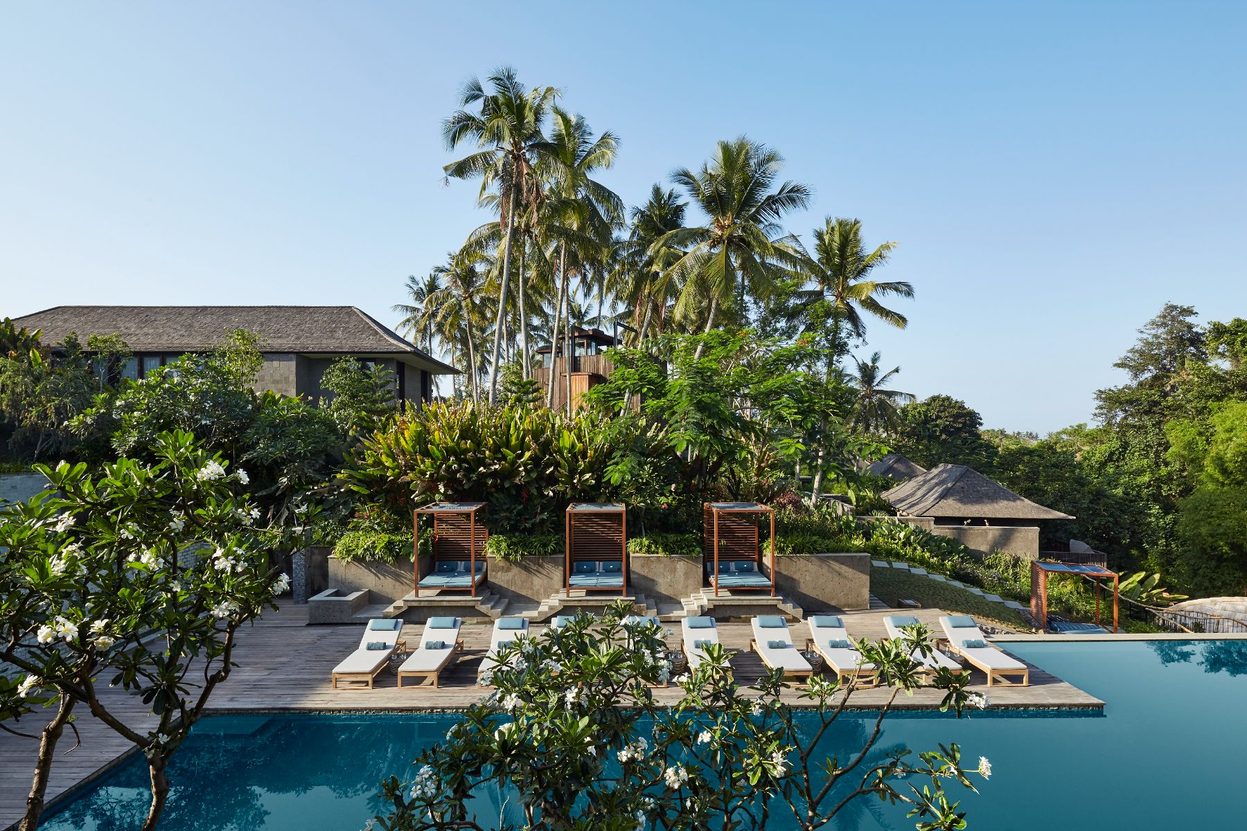 Swimming pool at Nirjhara luxury resort in Bali