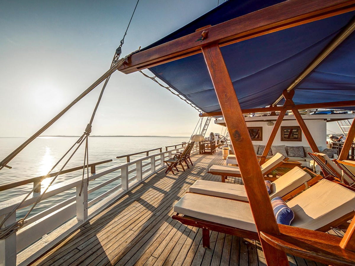 Sun loungers on the deck of Ombak Putih in Indonesia