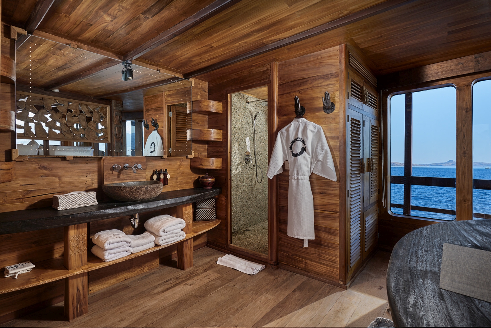 Main bathroom with Oracle robe and towels