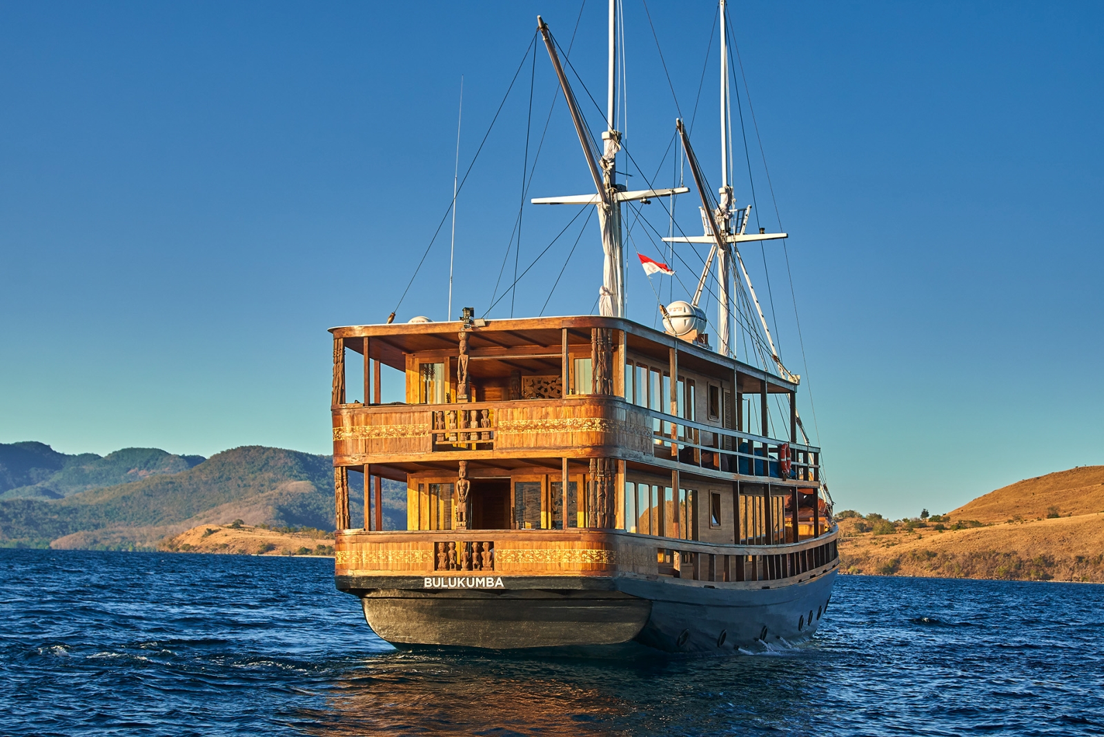 Exterior of Oracle's stern in front of Komodo