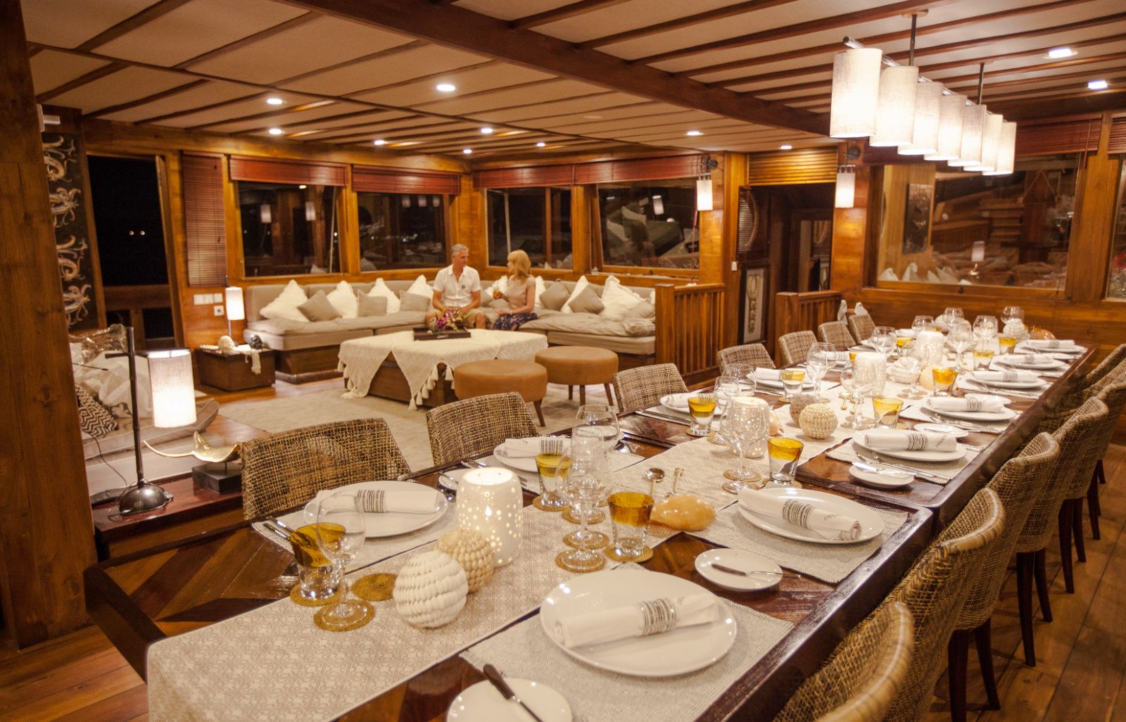 Indoor dining area onboard the Prana phinisi in Indonesia