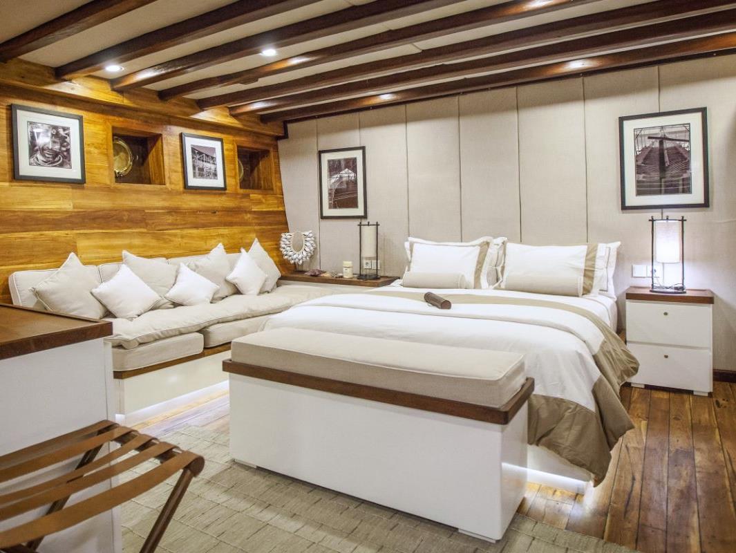 A suite bedroom onboard the Prana phinisi in Indonesia