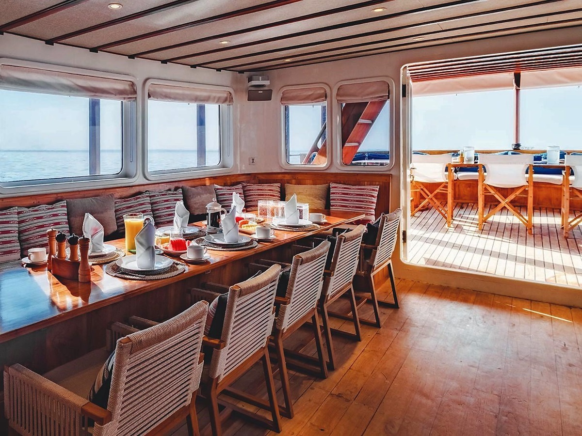 Indoor dining area on Luxury Yacht Rascal
