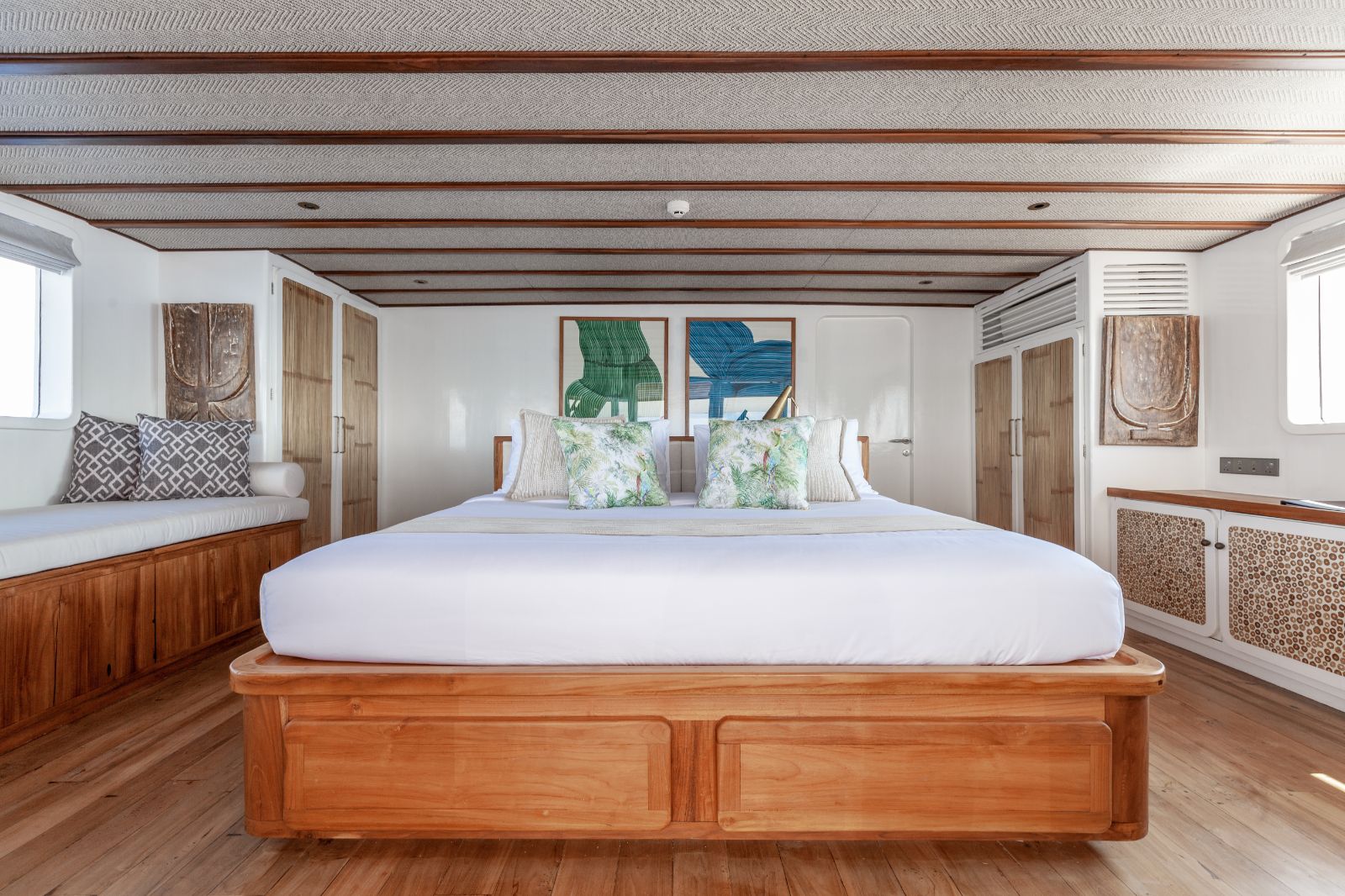 Master suite bedroom on the Rebel phinisi in Indonesia