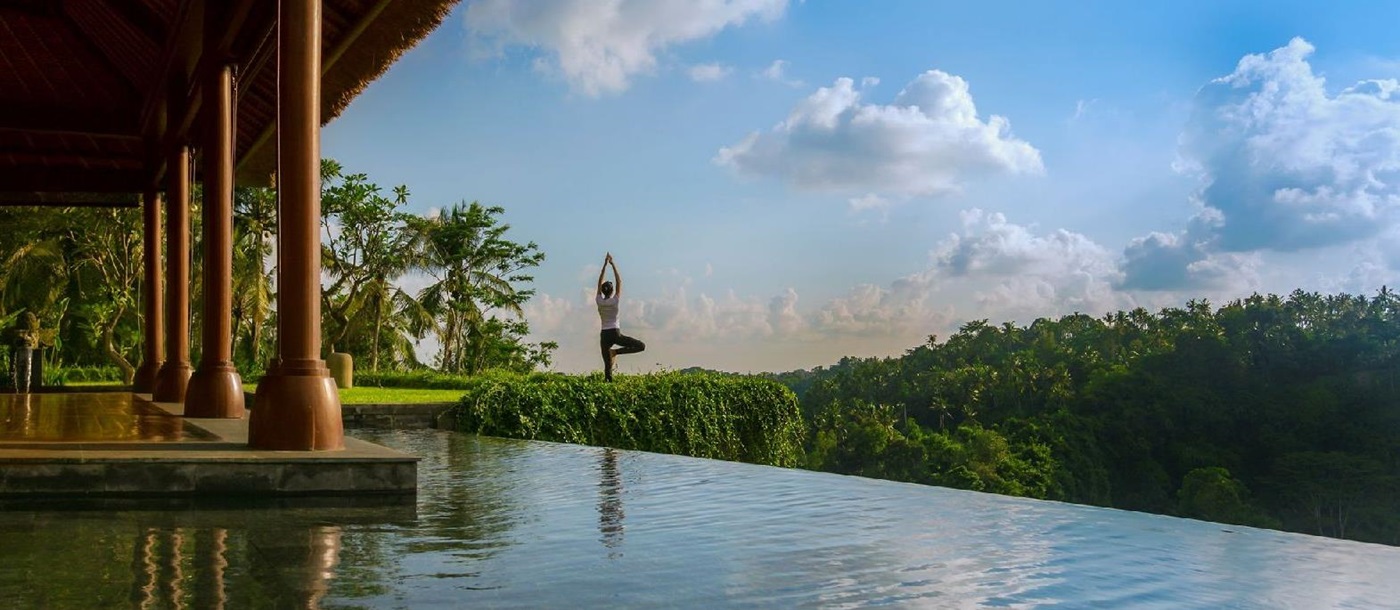Yoga by the pool at the Ritz Carlton Mandapa Indonesia