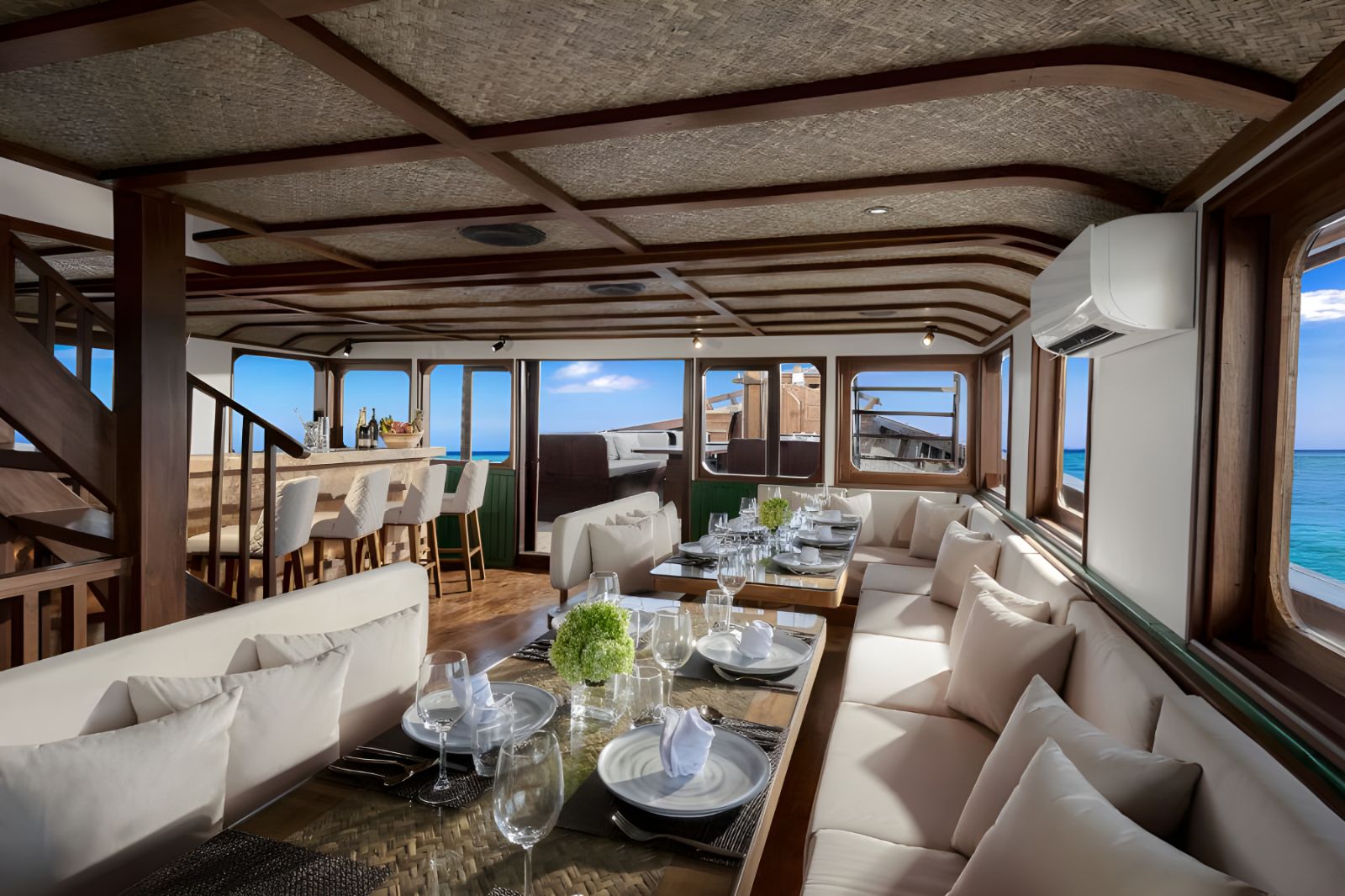 Indoor dining room onboard the Samsara Samudra phinisi in Indonesia