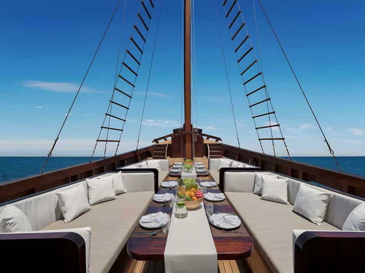 Outdoor dining and deck area onboard the Samsara Samudra phinisi in Indonesia