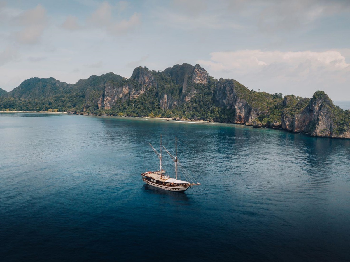 Aerial long shot of the Senja phinisi in Indonesia