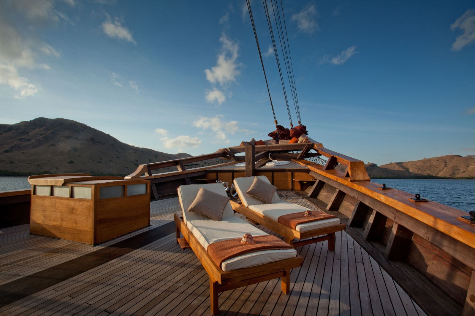 sunbeds and deck view onboard the Si Datu Bua phinisi in Indonesia