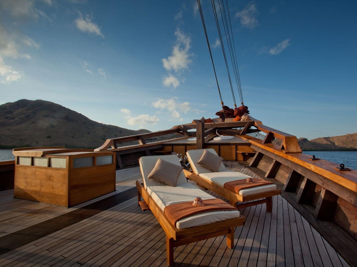 sunbeds and deck view onboard the Si Datu Bua phinisi in Indonesia