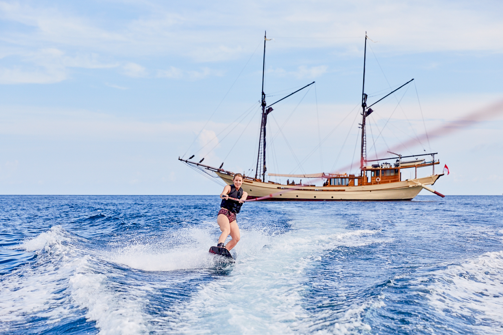 Waterskiing from the Silolona phinisi in Indonesia