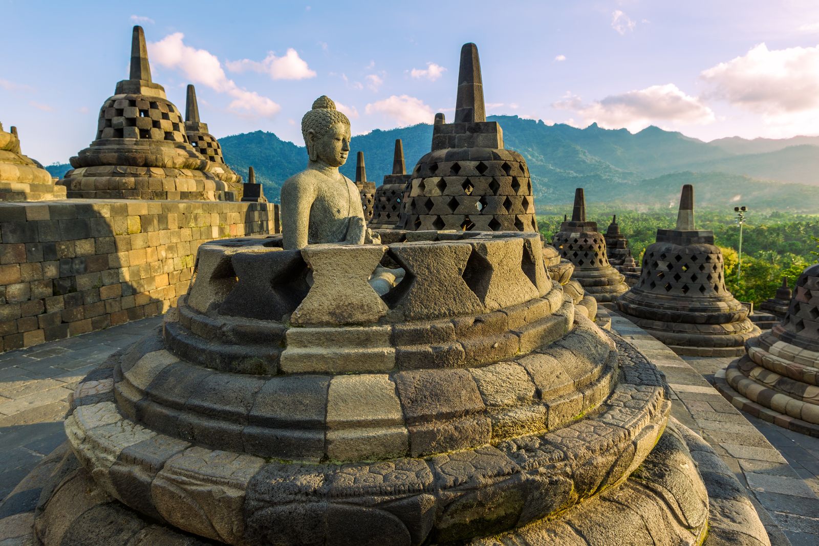 Seated buddha on a pagoda in Borobudur, Indonesia
