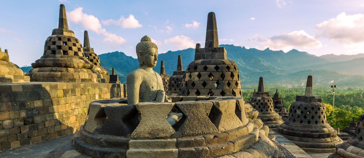 Seated buddha on a pagoda in Borobudur, Indonesia