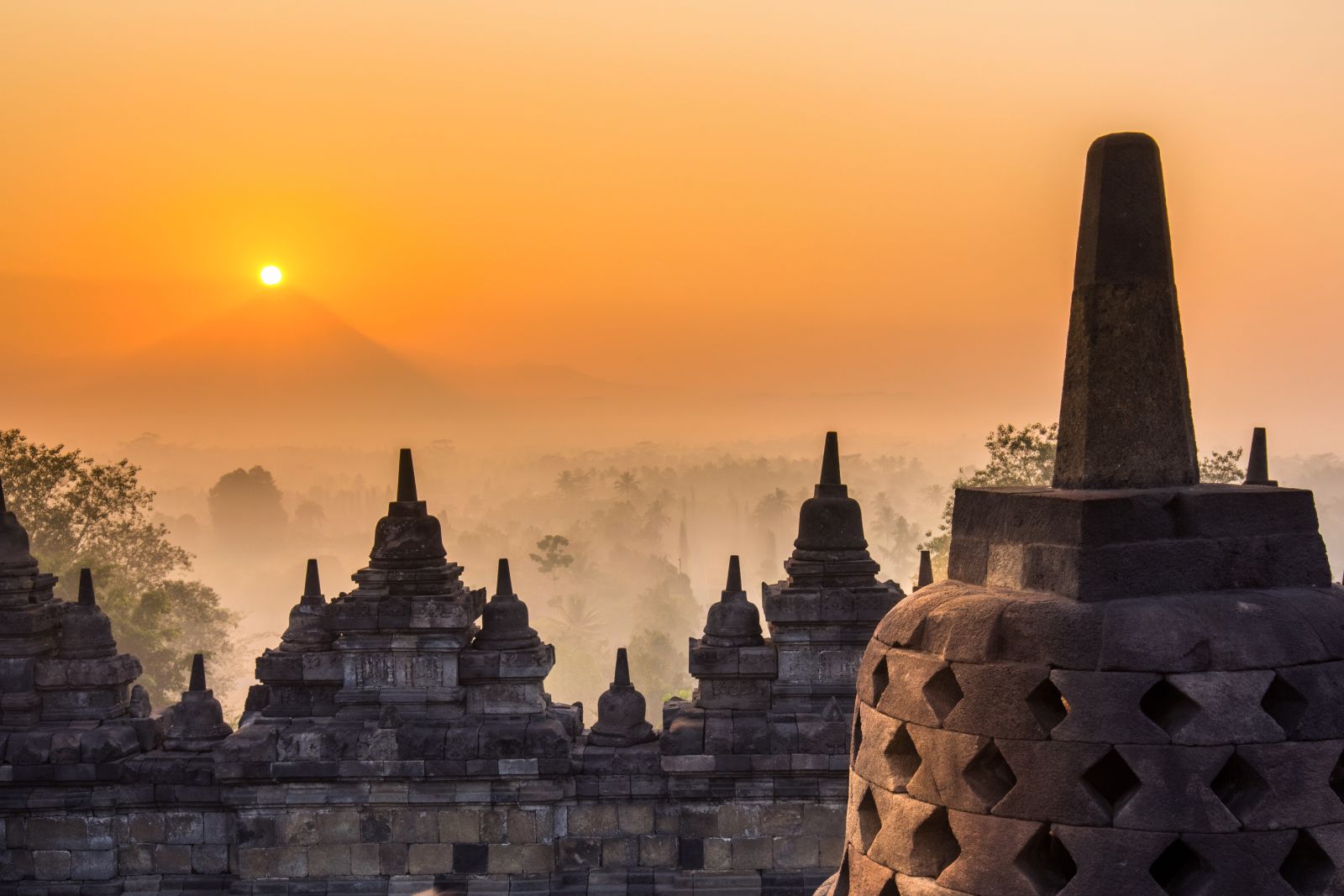 Silhouette of the Borobudur temples in Indonesia at sunset