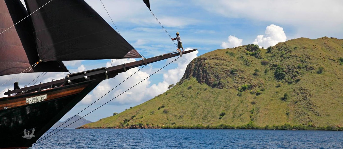Dunia Baru phinisi on the waters of the Komodo Islands in Indonesia