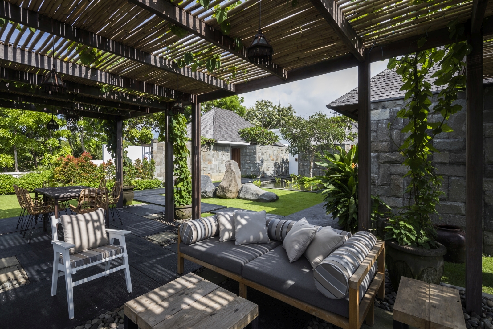 Shaded seating area at Uluwatu Estate, Bali