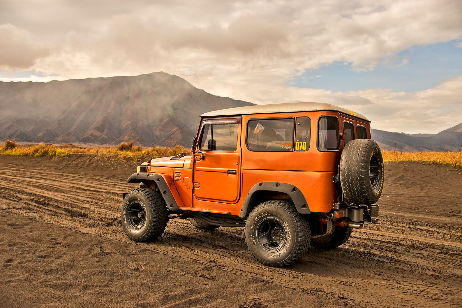 A jeep driving to the crater of Mount Bromo in Indonesia