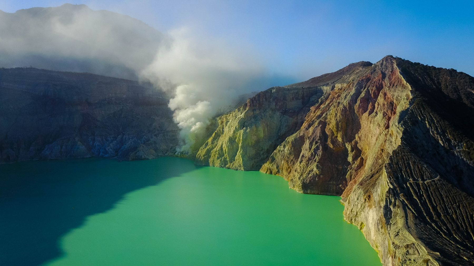 Green waters in the crater lake of Mount Ijen, Indonesia