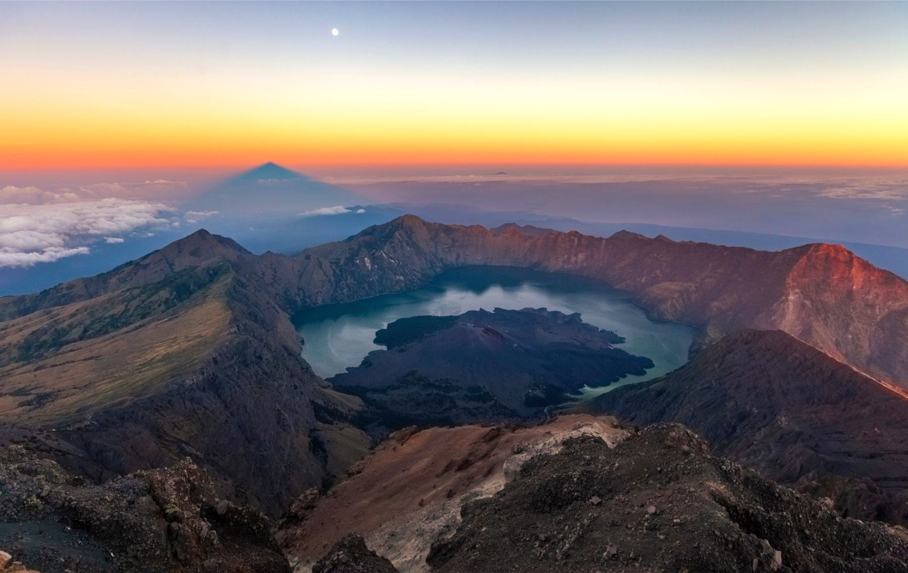 The crater of Mount Ijen in Indonesia at sunrise