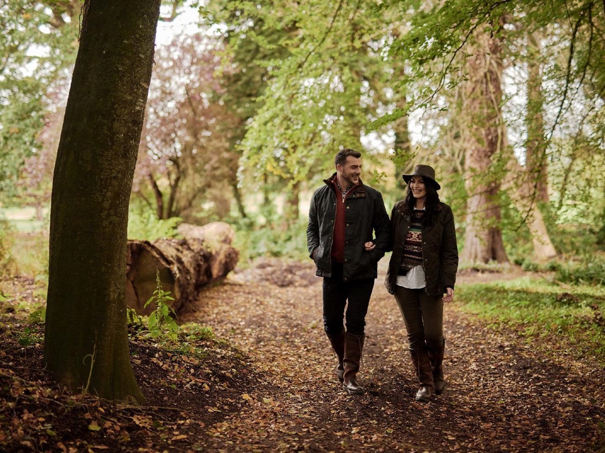 Guests enjoying a woodland walk from Adare Manor near Limerick in Ireland