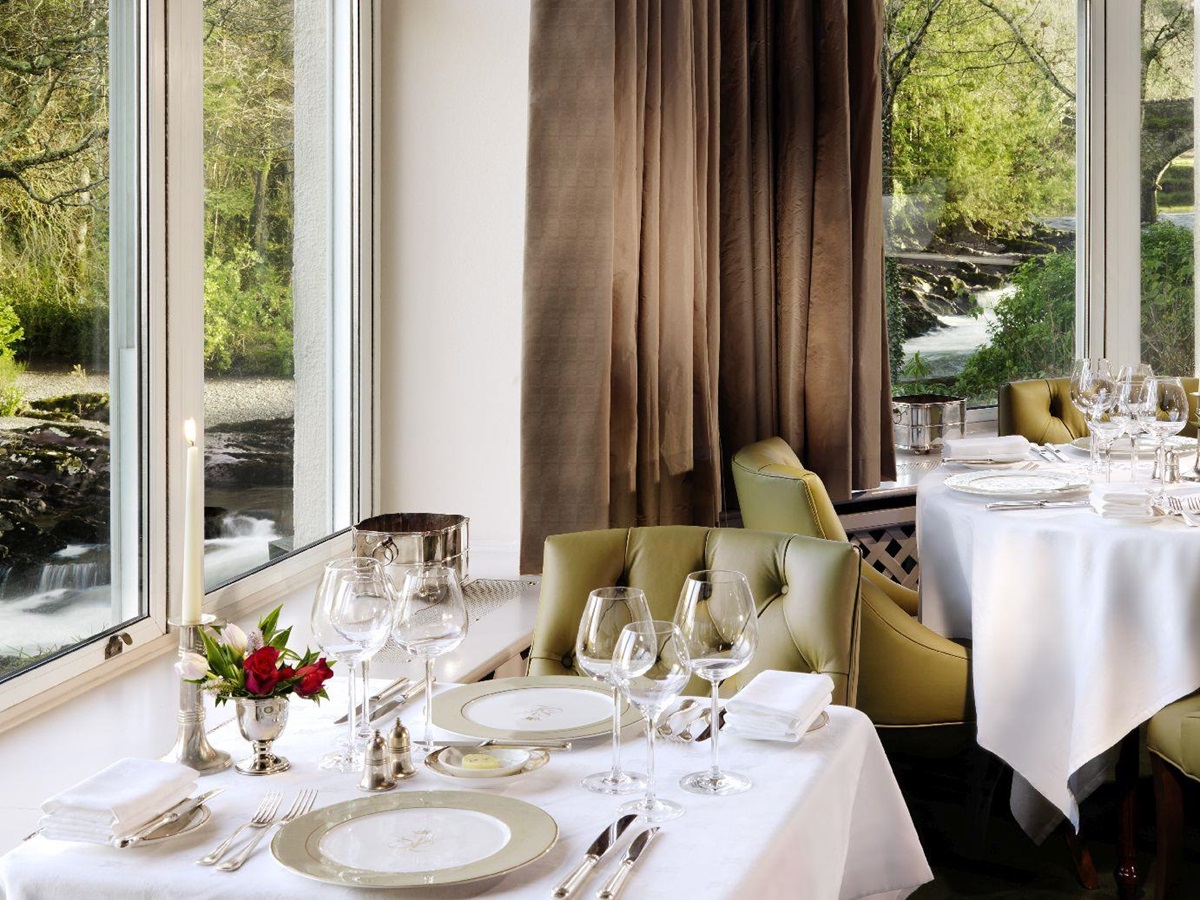 River view table at The Falls restaurant at Sheen Falls Lodge in Ireland