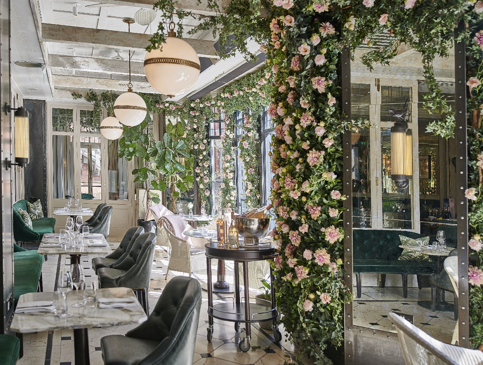 Greenery filled Wilde restaurant at The Westbury hotel in Dublin Ireland