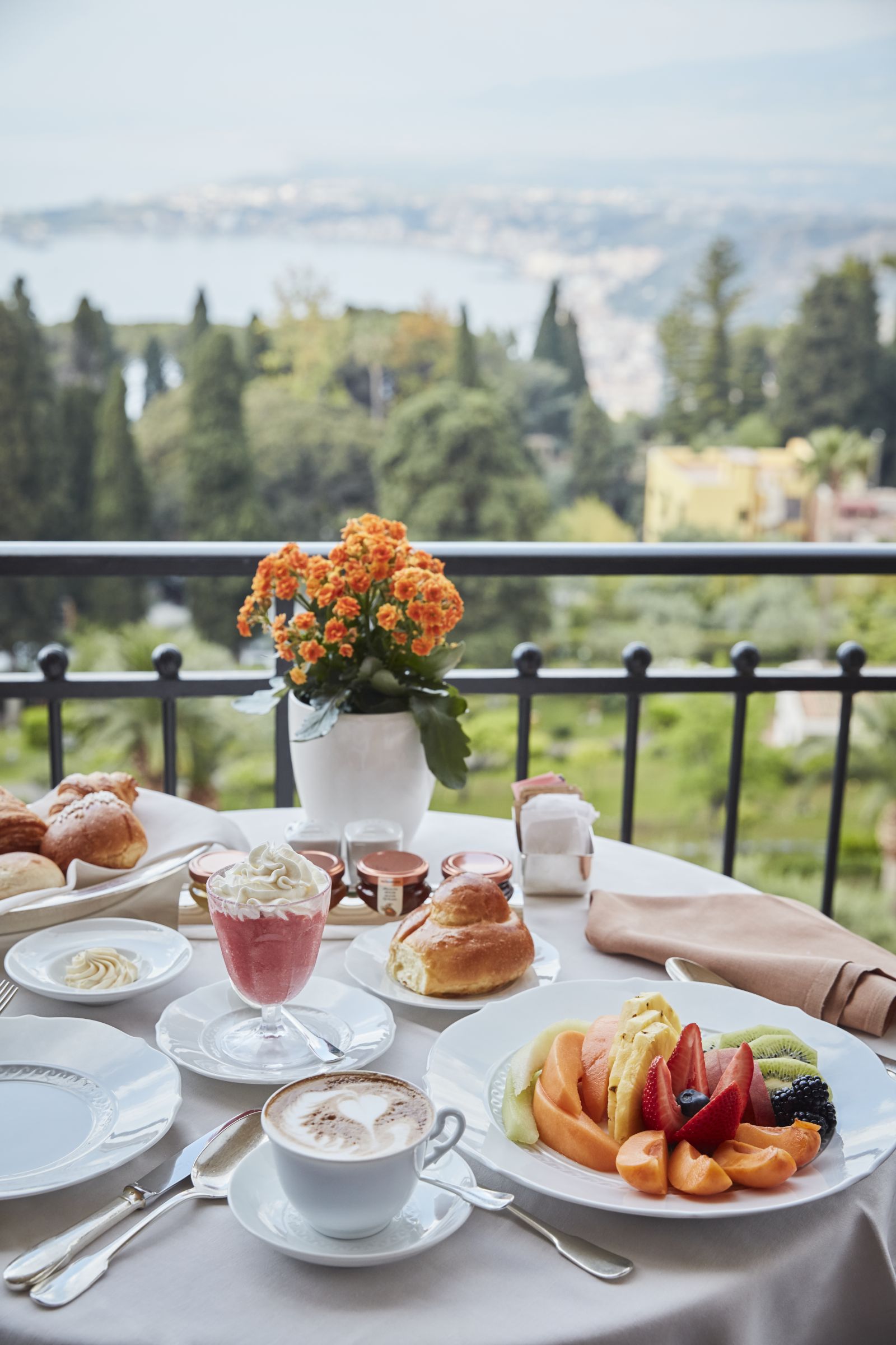 Breakfast on the balcony at the Belmond Grand Hotel Timeo in Sicily