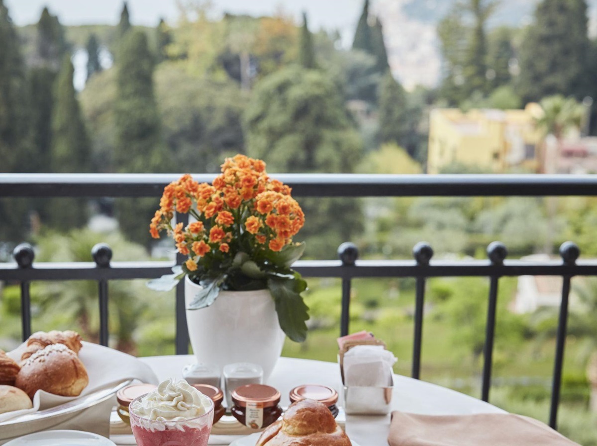 Breakfast on the balcony at the Belmond Grand Hotel Timeo in Sicily