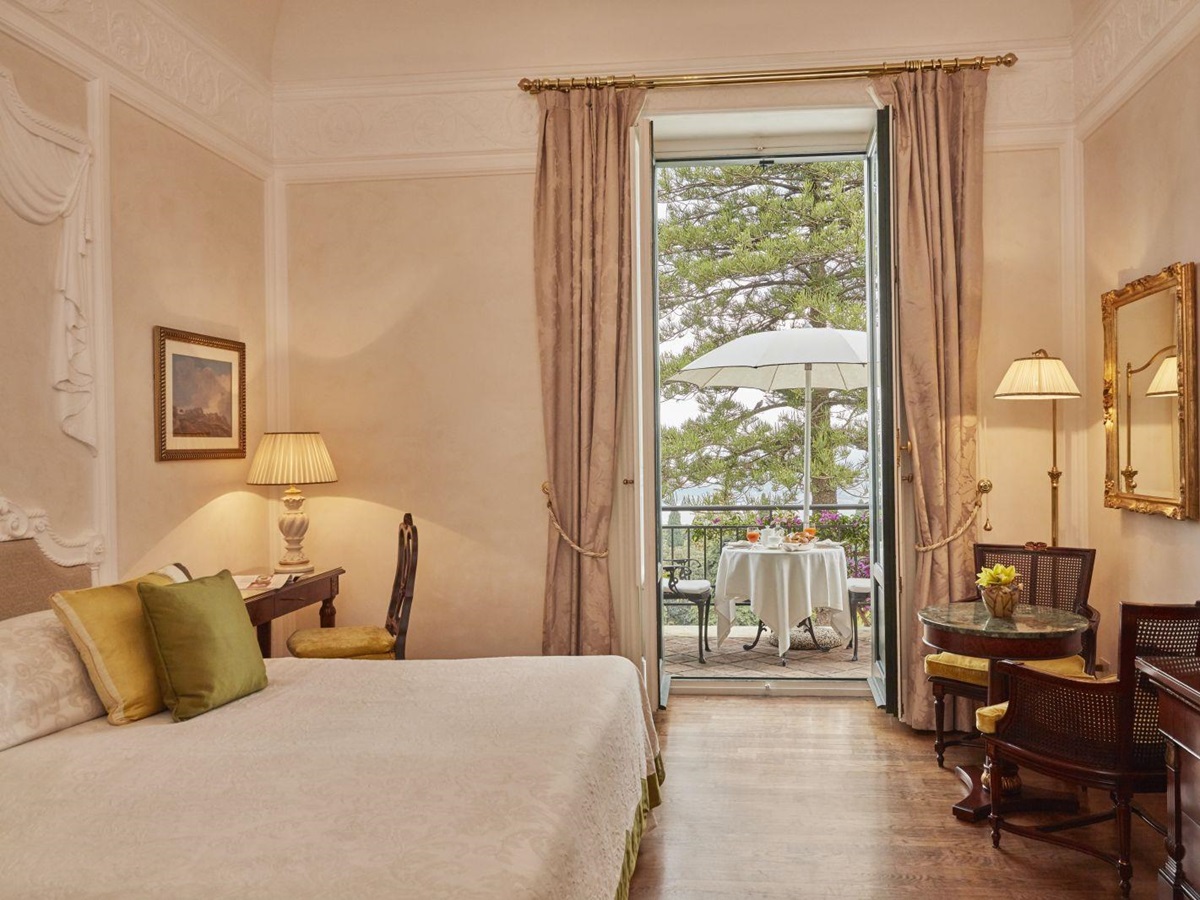 Guest room and balcony at the Belmond Grand Hotel Timeo in Sicily