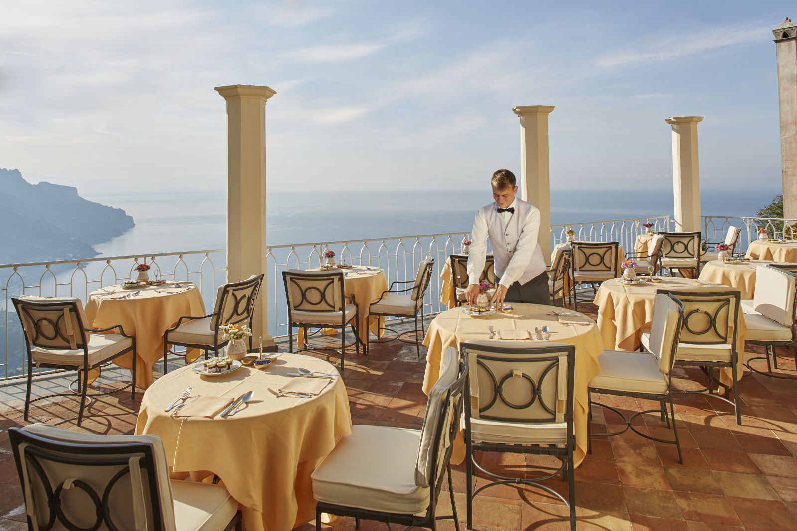 Outdoor dining with Amalfi Coast views at Belmond Hotel Caruso in Ravello Italy