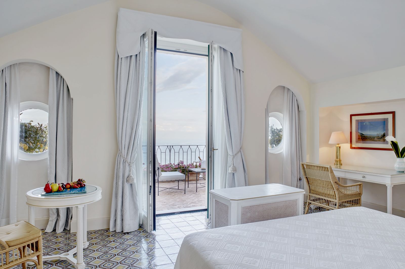 Guest room and terrace at Belmond Hotel Caruso in Ravello Italy