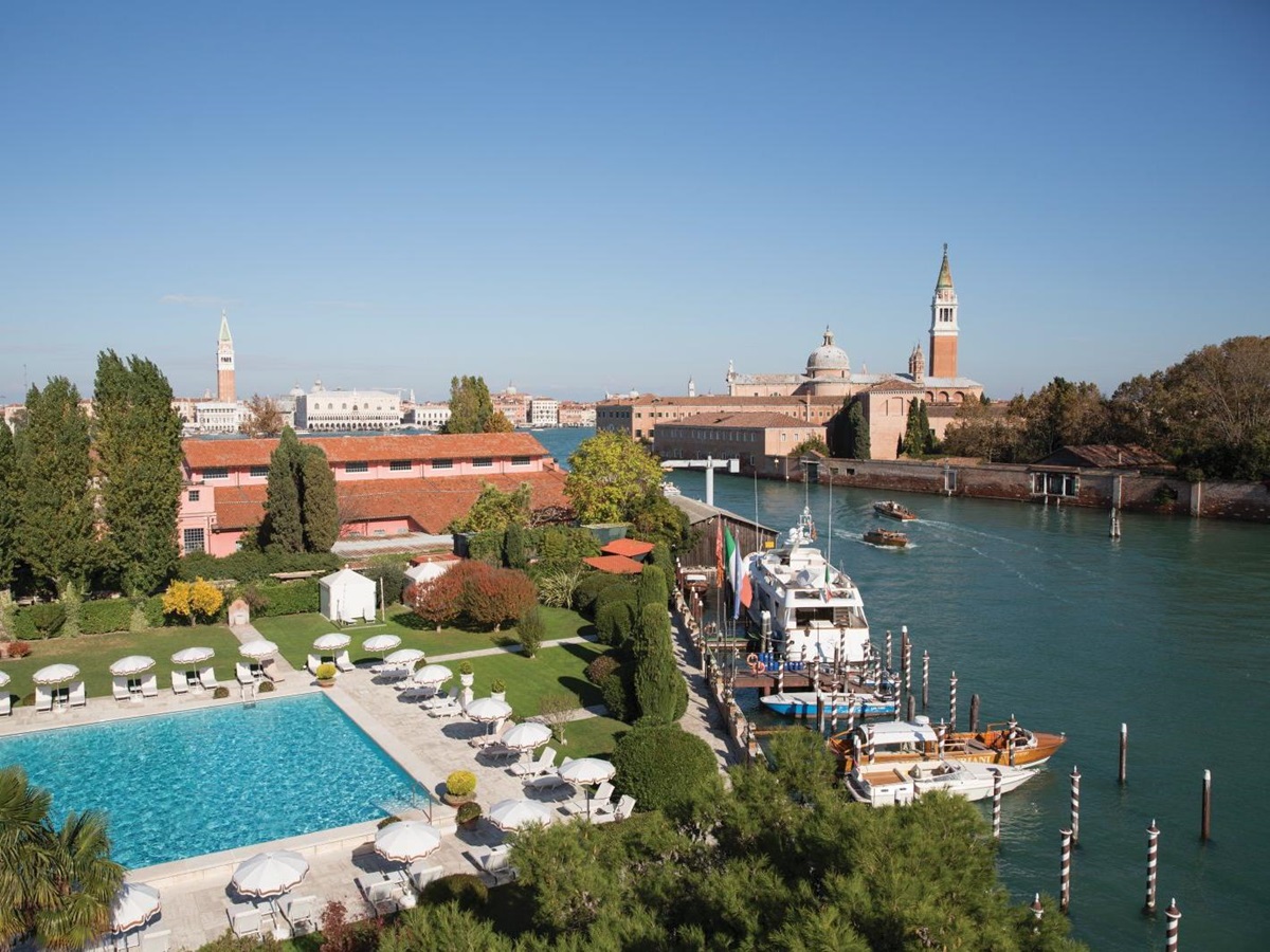 The swimming pool and views of St Mark's Square at Belmond Hotel Cipriani in Venice