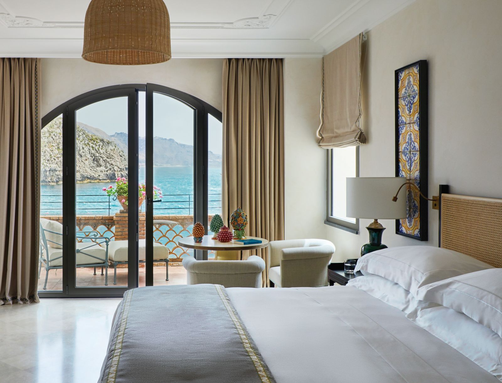 Guest room with balcony at Belmond Villa Sant'Andrea in Sicily