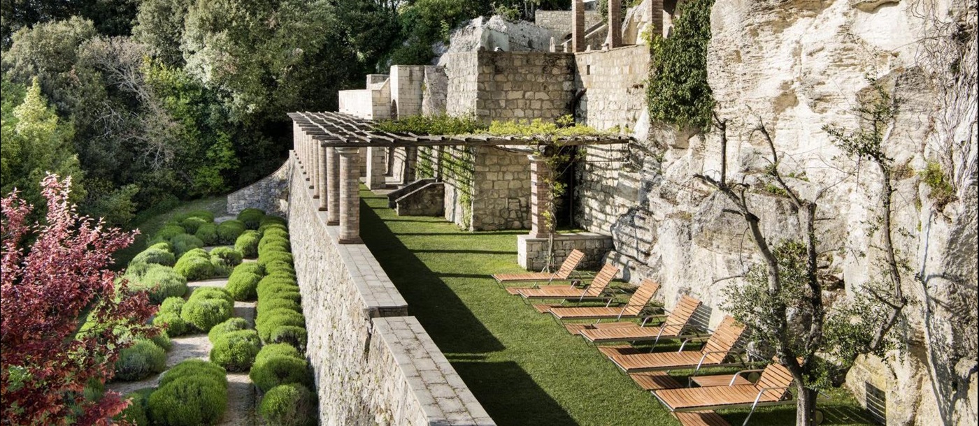 Expansive gardens of Borgo Pignano in Tuscany