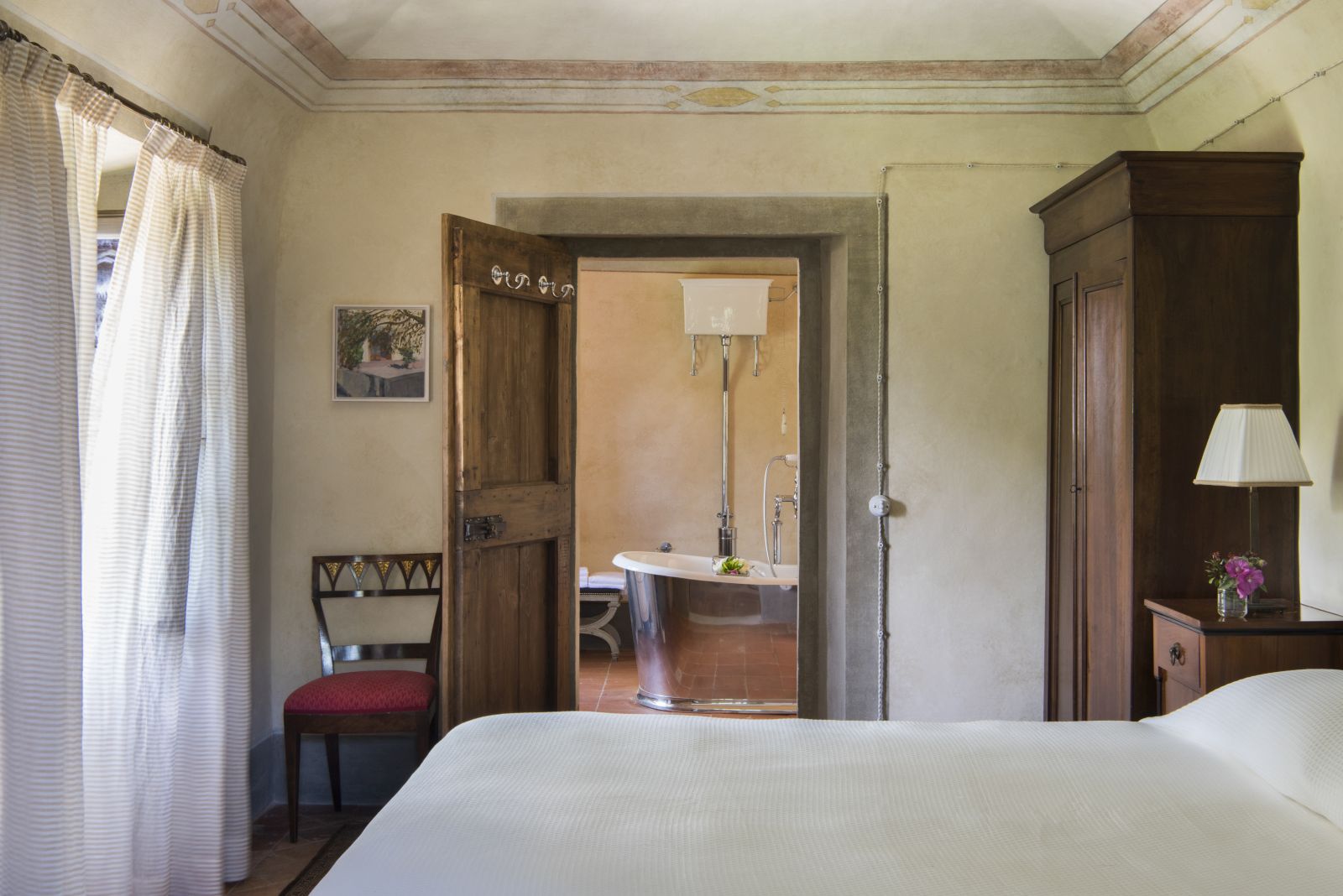 Guest room in La Canonica at Borgo Pignano in Tuscany
