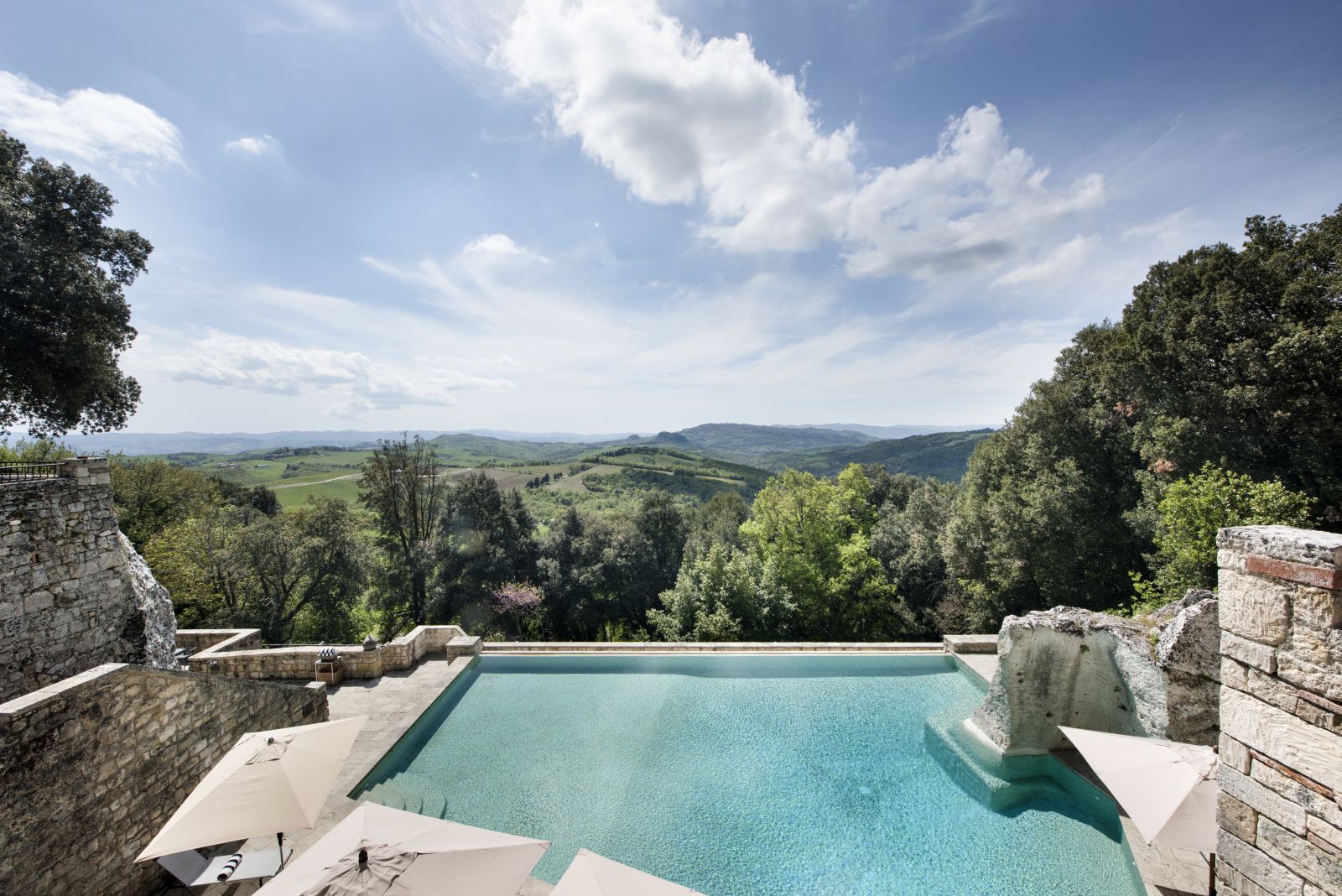 Swimming pool and views at the Borgo Pignano in Tuscany