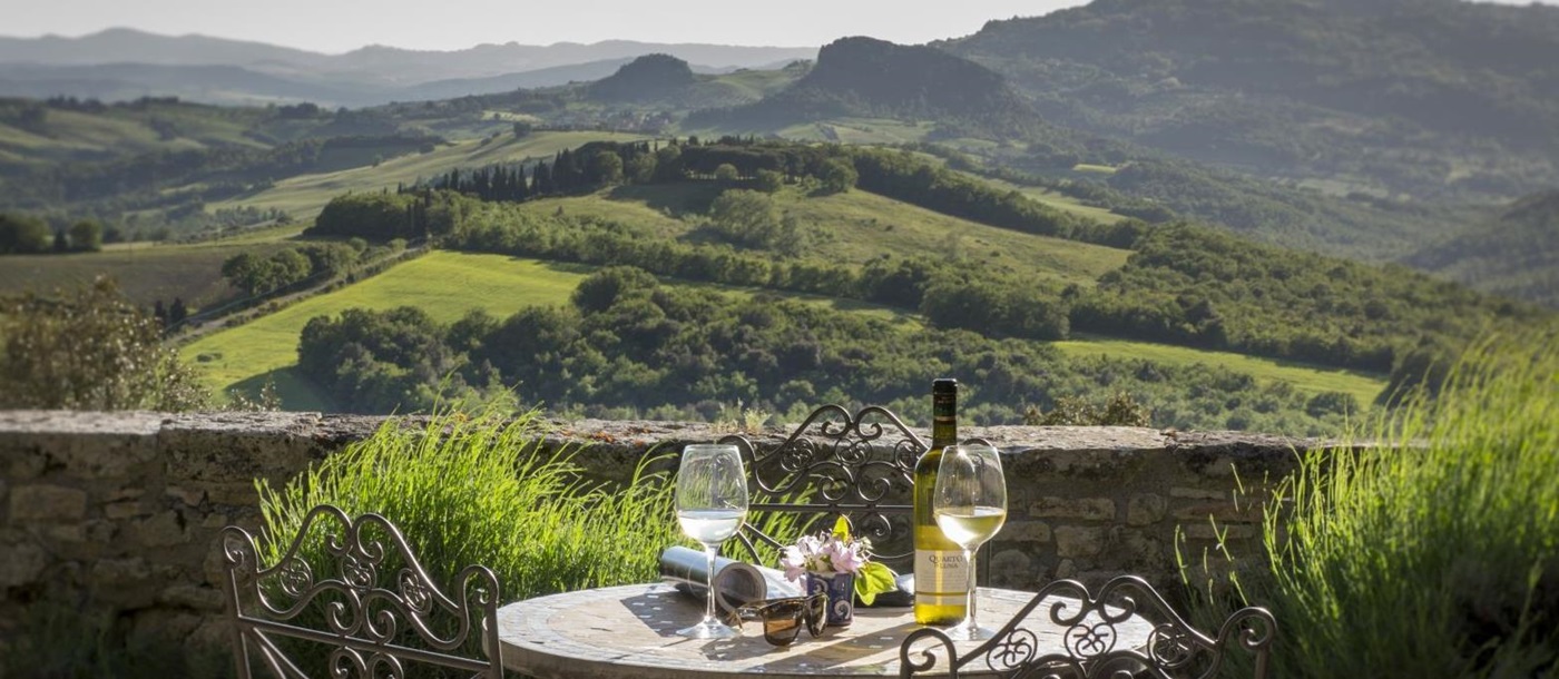 Views of the Tuscan hills from the terrace at Borgo Pignano in Italy