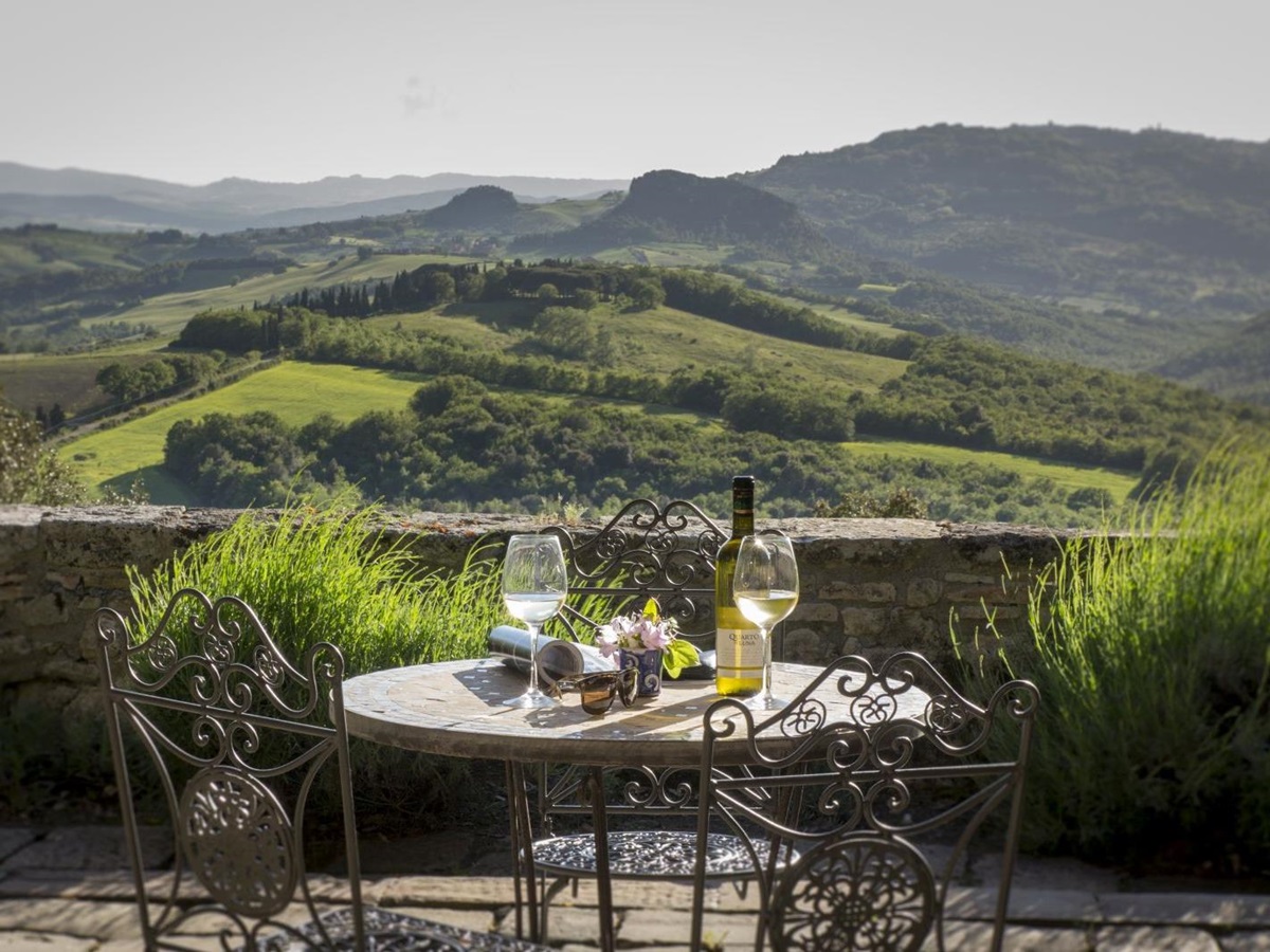 Views of the Tuscan hills from the terrace at Borgo Pignano in Italy