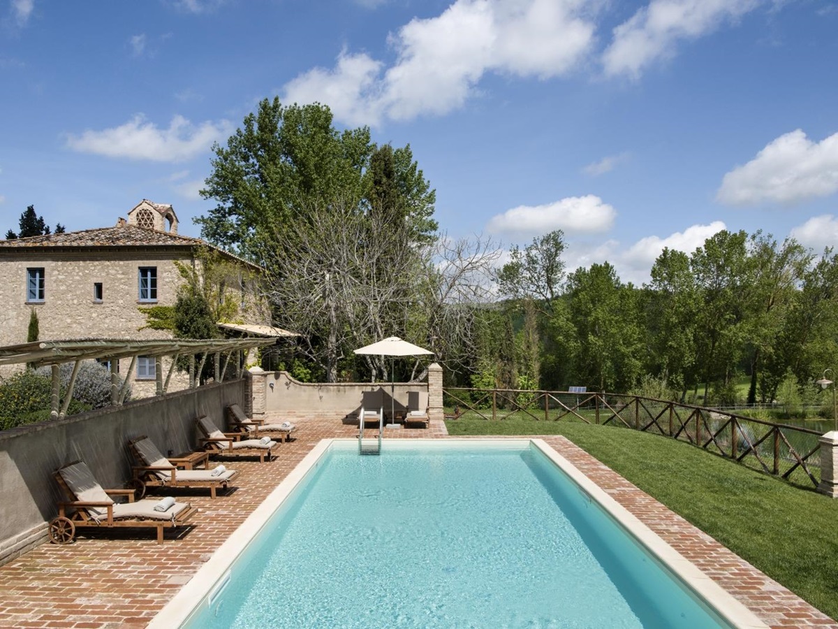 Villa with swimming pool at Borgo Pignano in Tuscany